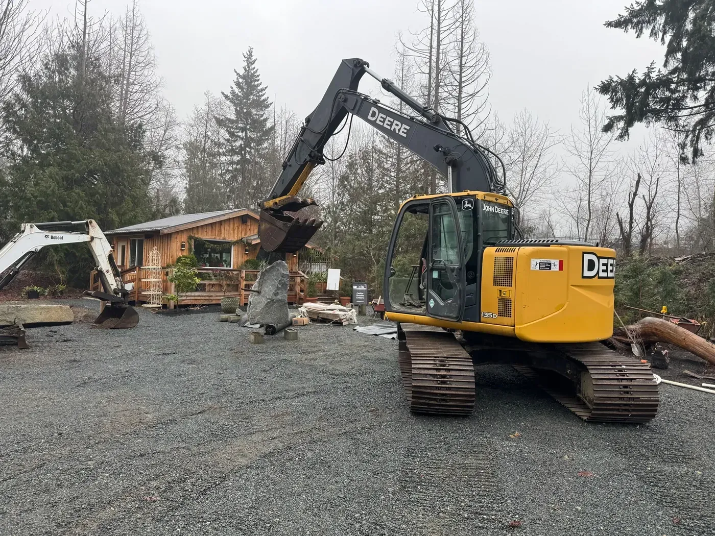Excavator working a residential site during site preparation